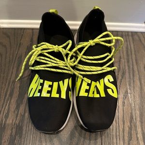 Heely’s: The Original Wheeled Shoe. Size 8. Black with neon yellow lace-up